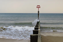 Load image into Gallery viewer, Sea breaker breaking waves on a sandy beach.